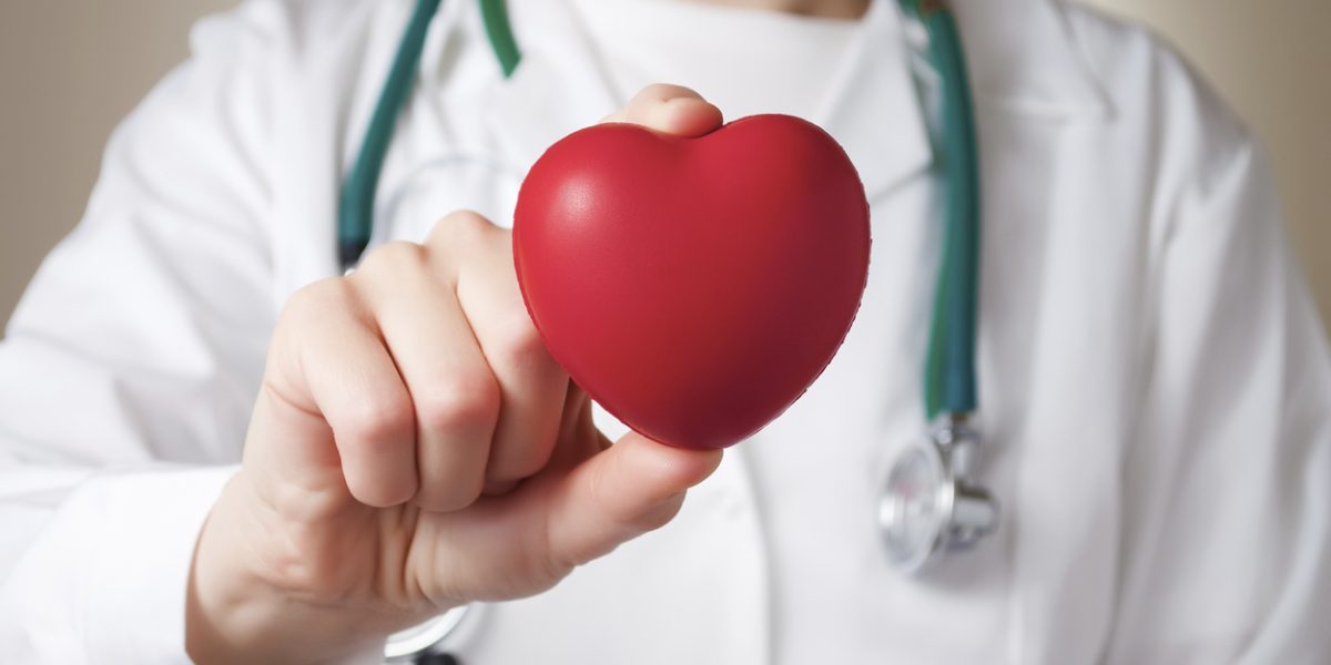 Heart in doctor's hand